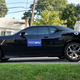 The Wu campaign’s two-car fleet includes this Dodge Charger which Frank Wu drives as they canvass the neighborhoods. Brianna drives an older Porsche Boxster she bought used and has been fixing up when she needs a distraction from the campaign.